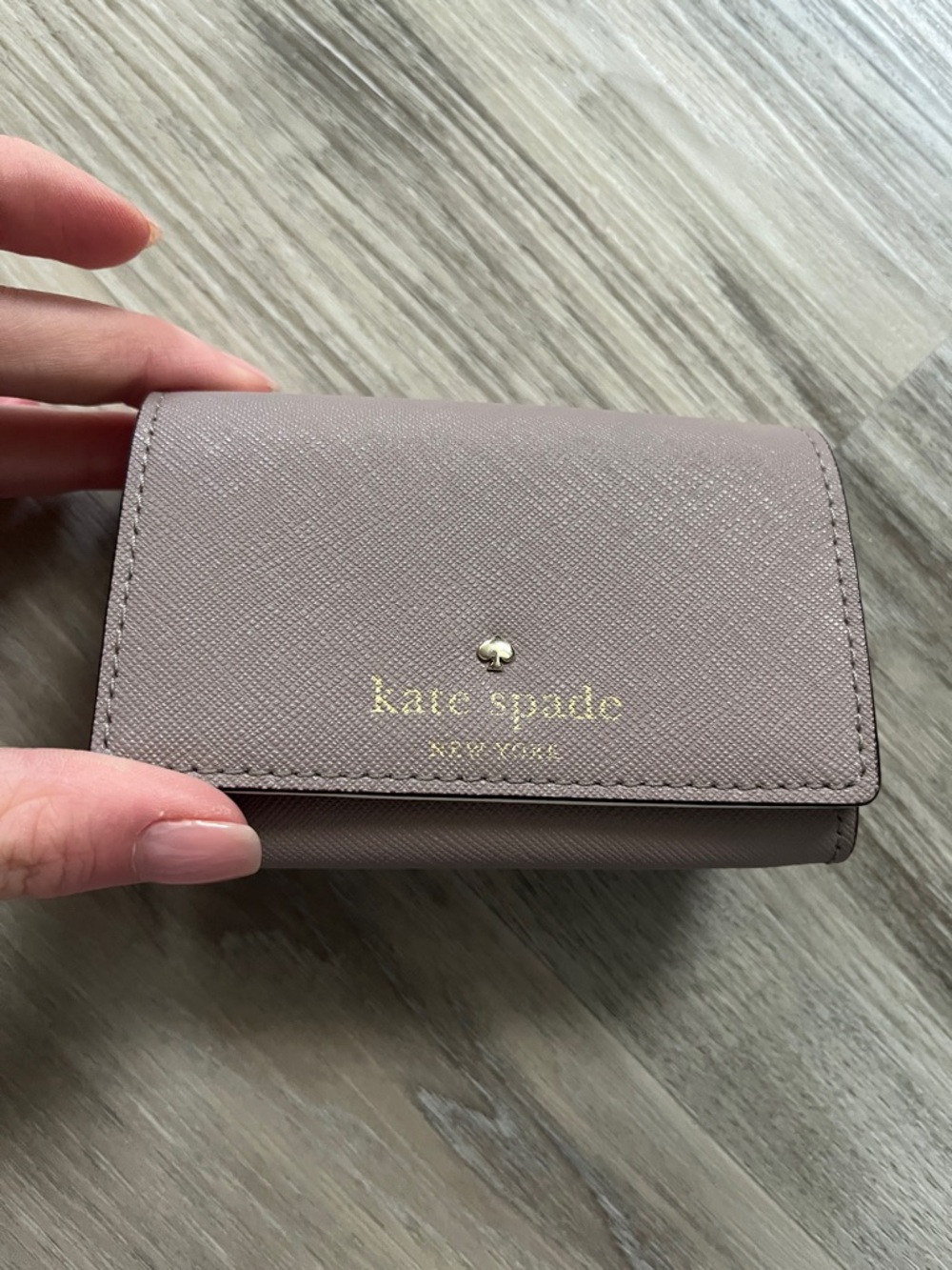 kate spade Small Foldover Card Case in Mauve Taupe with Gold Logo